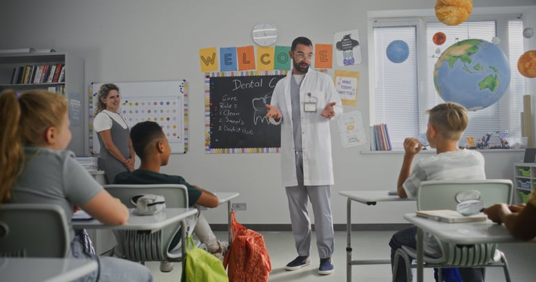 Healthcare professional giving an educational talk to an attentive group